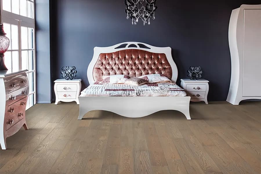 Bedroom scene from the room visualizer, showing a new floor in place
