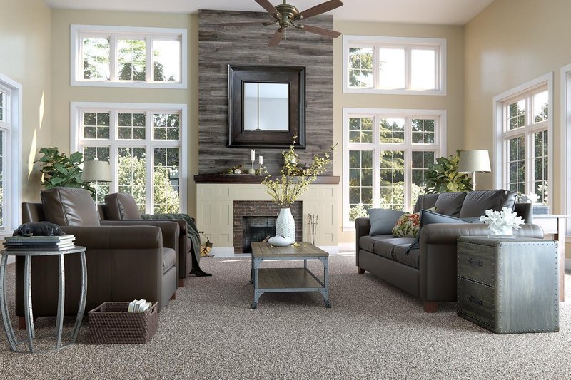 Living room with laminate flooring feature wall above fireplace